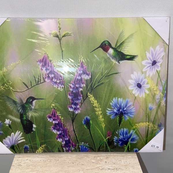 Decorative floral print with hummingbirds and purple-blue flowers