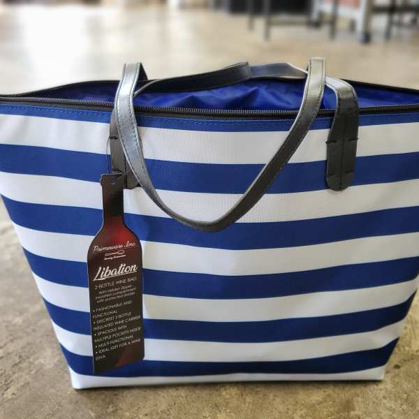 Blue and white striped tote bag with black handles and a hanging tag