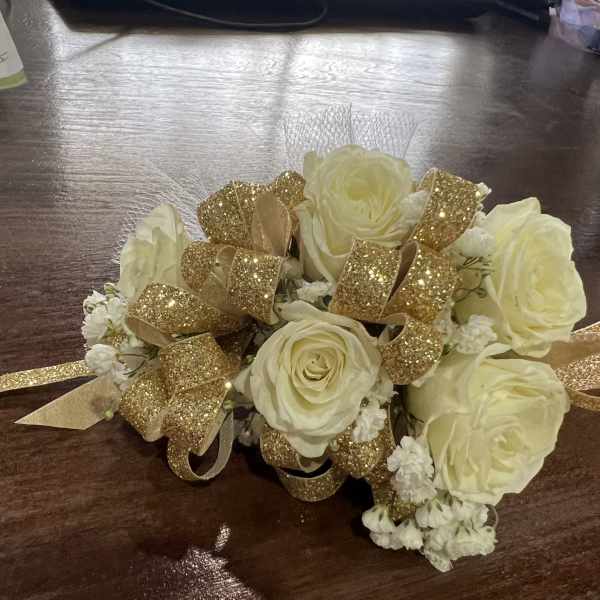 Cream rose bouquet with gold glitter ribbon accents