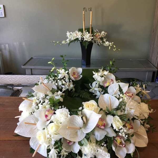 #148 ANTHURIUM & CYMBIDIUM GARDEN URN & PHOTO ARRANGEMENT