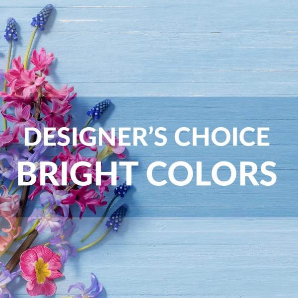 Bright pink and purple flowers on a blue wooden background with text overlay