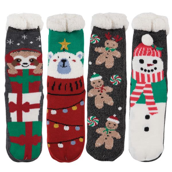 Four holiday socks with Christmas characters and gift patterns