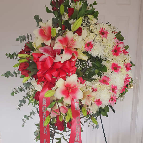 Hints of Red Funeral Spray