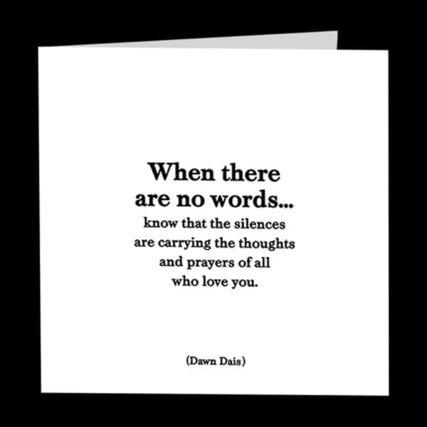 White sympathy card with a black condolence message