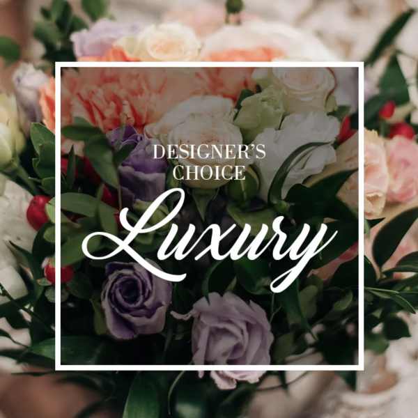 Mixed bouquet of roses and other blooms in pink, white, and lavender