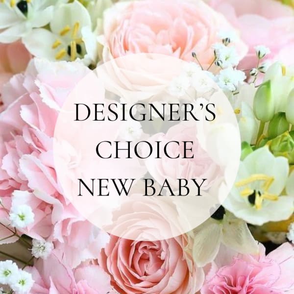 Pink and white floral arrangement with roses and lilies, labeled New Baby