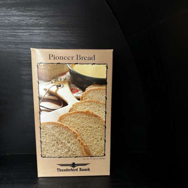 Box of Pioneer Bread mix on a dark shelf