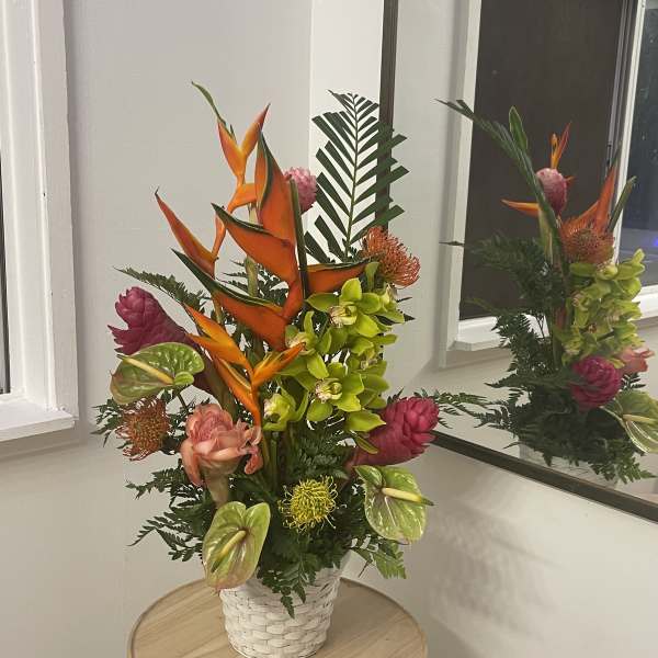 Tall and airy arrangement in a basket