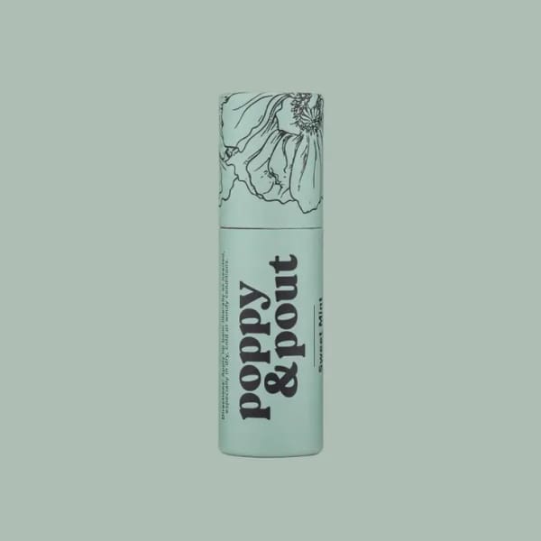 Mint-green lip balm tube with floral line art and bold text