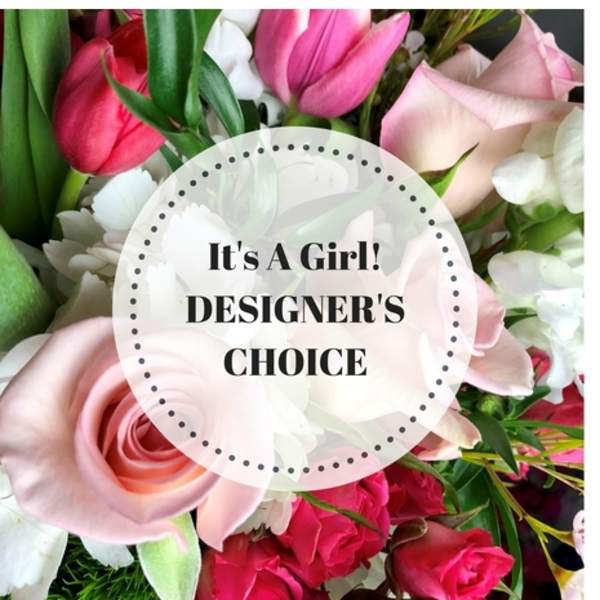 Mixed pink and white flowers with a circular "It's A Girl!" label
