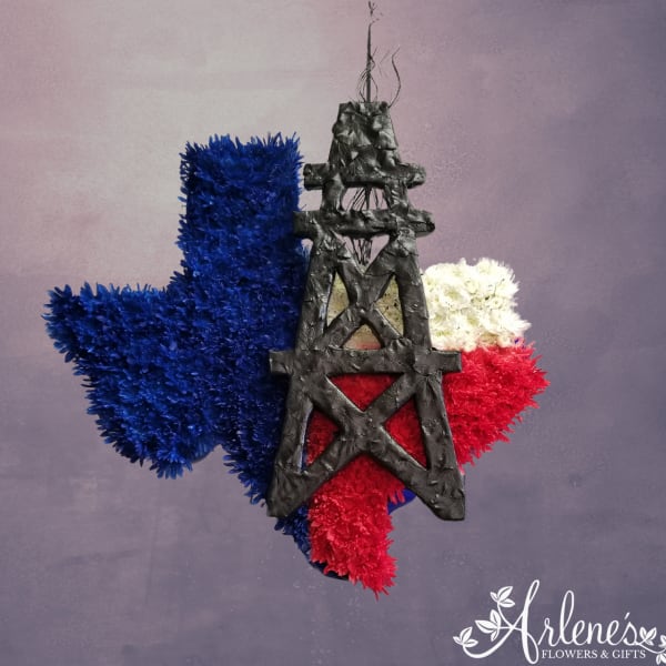 Blue, red, and white floral arrangement shaped like a tower