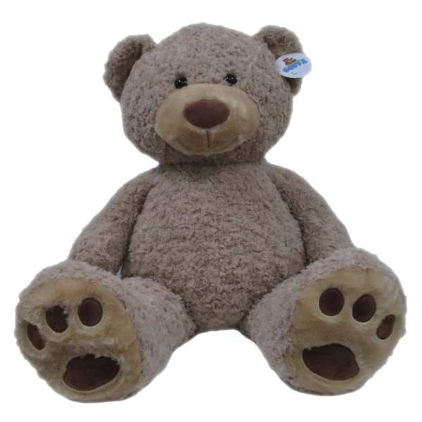 Plush teddy bear sitting upright on a white background