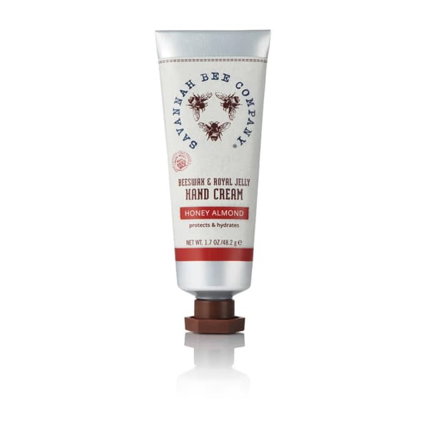 Tube of hand cream with bee graphics and a brown cap