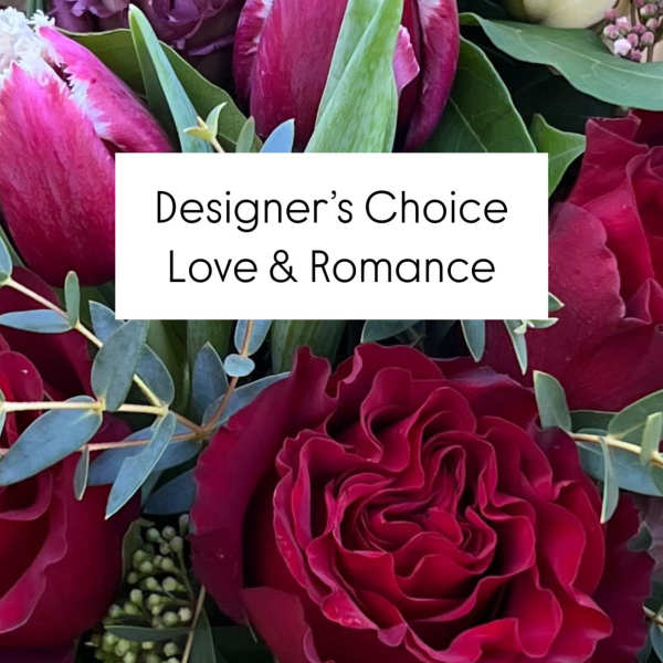 Bouquet of red and pink roses with tulips and purple blooms