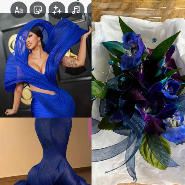 Blue floral bouquet with ribbon and green leaves