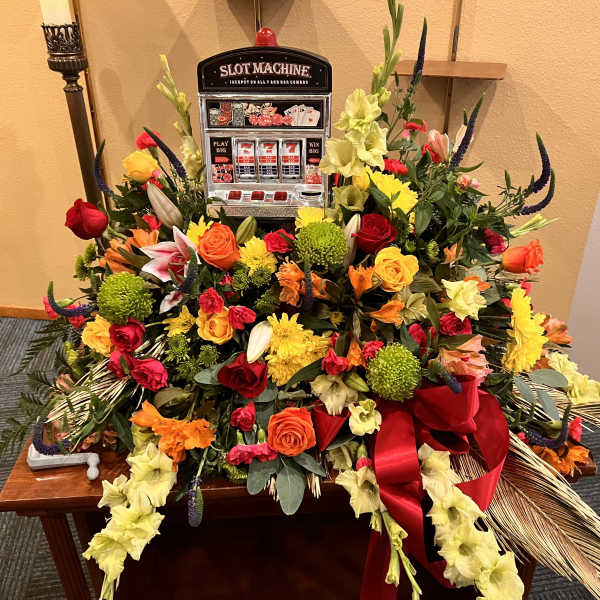 CASKET SPRAY - HOOT LOOT SLOT CASKET FLOWERS