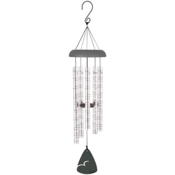 A hanging metal wind chime with silver tubes and a dark top and clapper