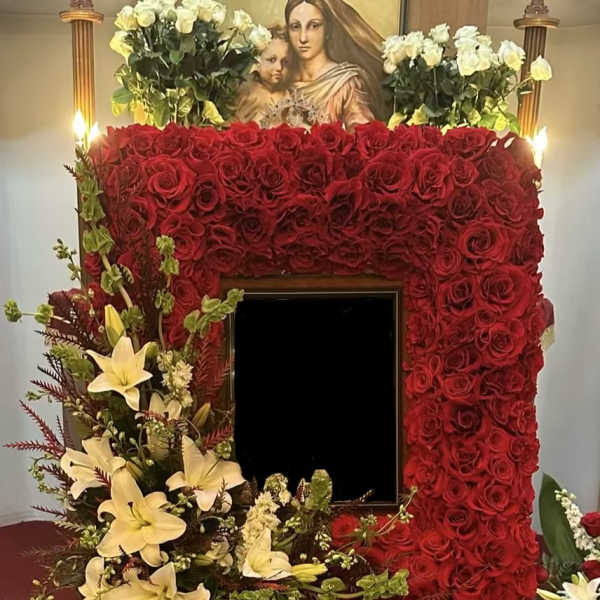 Large red rose floral frame with white lilies and a central photo opening