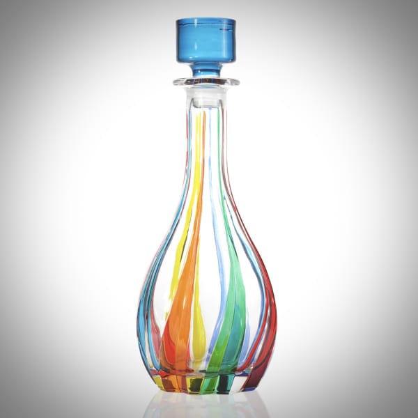 Colorful glass vase with a blue top and multicolor swirls