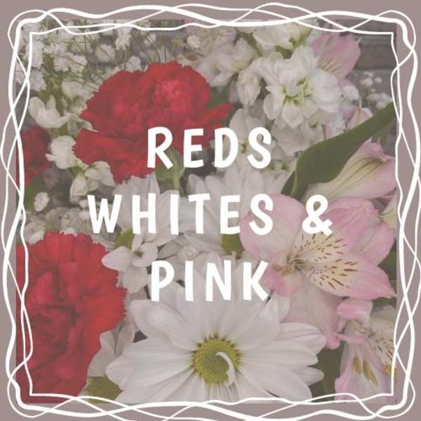 Mixed bouquet of red, white, and pink flowers