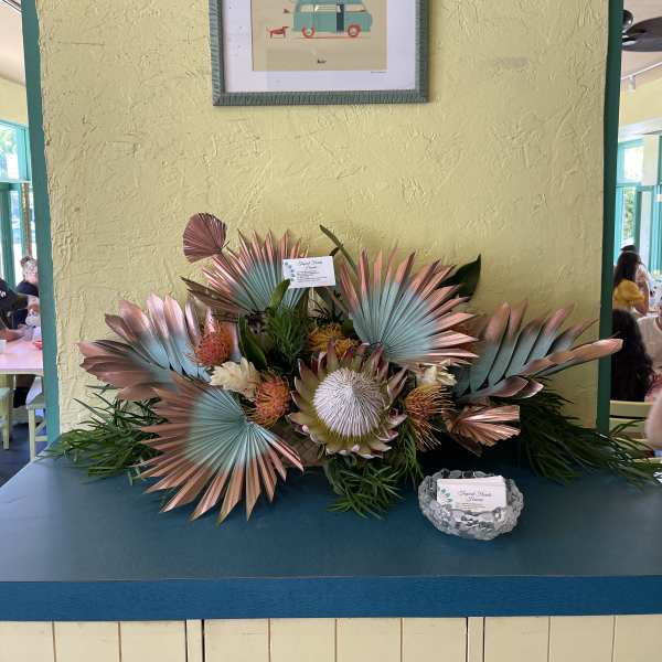 designers choice Low and compact centerpiece arrangement with rose gold accentaccents
