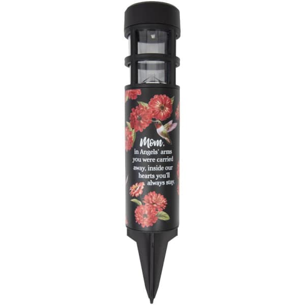 Black memorial solar light with pink flowers and a sympathy message