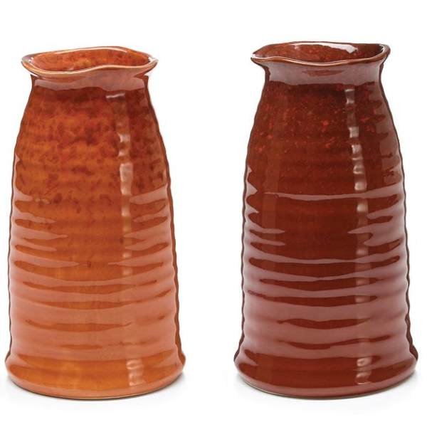 Two amber ceramic vases with ribbed sides and wavy rims