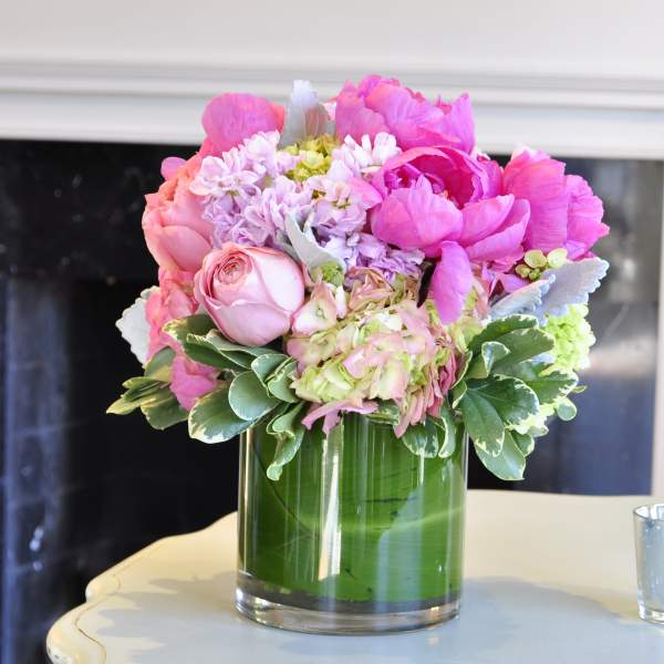 Pink and lavender bouquet in a clear glass vase