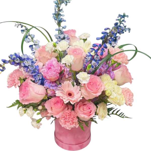 Pink and white bouquet in a pink hatbox with blue accents