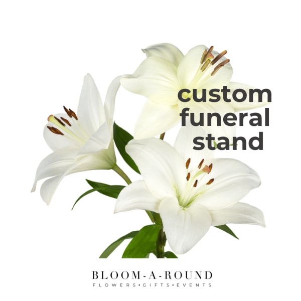 White lilies with green leaves and text reading custom funeral stand
