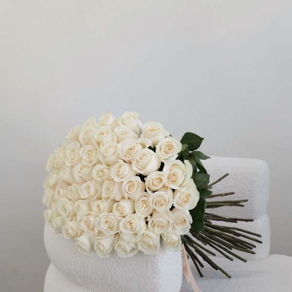 Large bouquet of cream roses with long stems