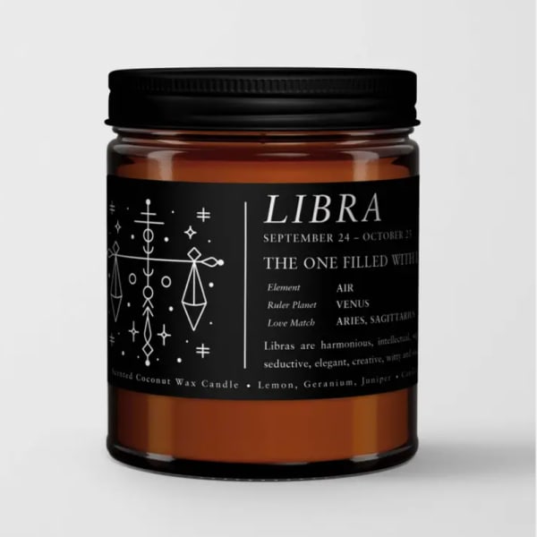 Amber candle in a black-lidded jar with a Libra label