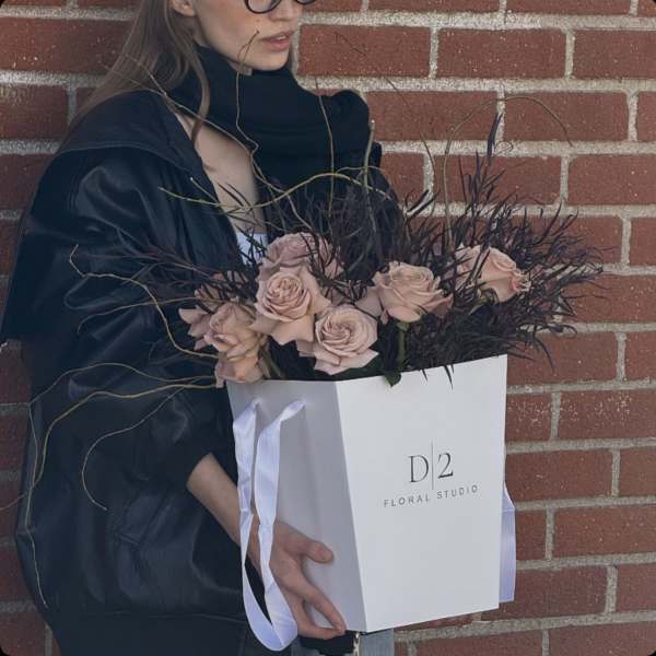 Bouquet of blush roses in a white gift box