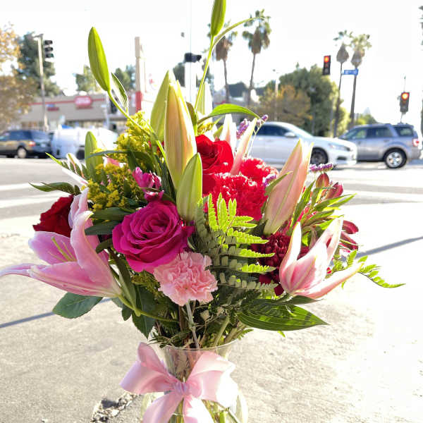 Lily and pink Roses plus other flowers