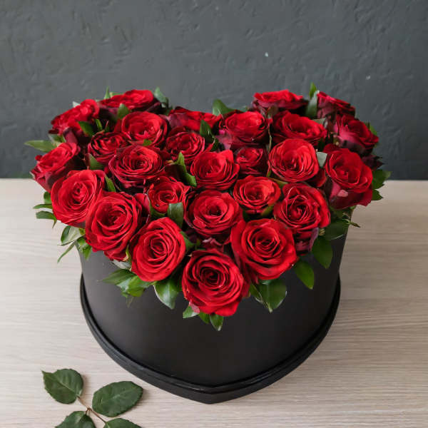 Heart-shaped box of red roses