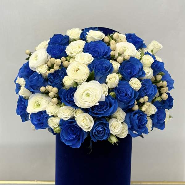 Blue and white rose bouquet in a dark blue box