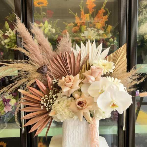Dried Palm Pampas and orchid Floral Arrangement