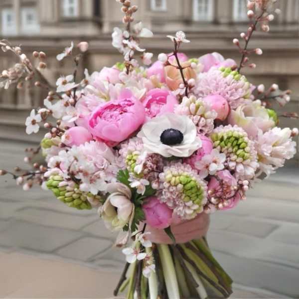 Pink and white bouquet with anemones and peonies