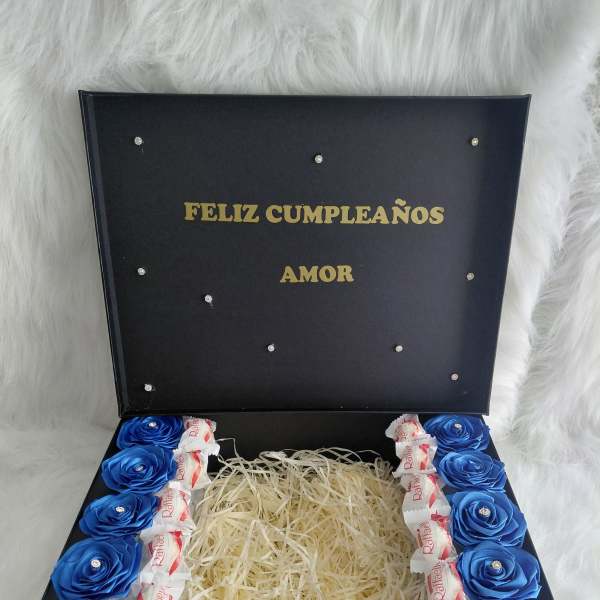 Handmade ribbon-rose box with chocolates and a personalized message.