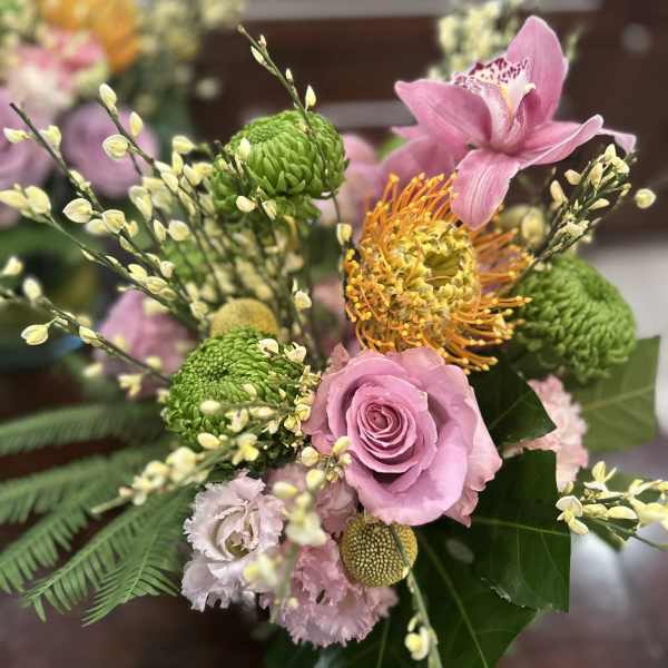 florist choice with exotics and roses (larger than shown)