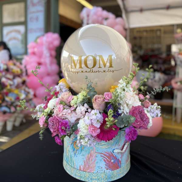 Balloon And Hat Box Floral Arrangement
