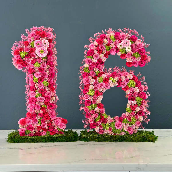 Floral number 16 made of pink and red roses