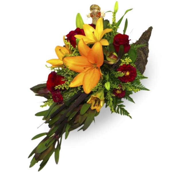 Bouquet of orange lilies and red roses with a small figurine
