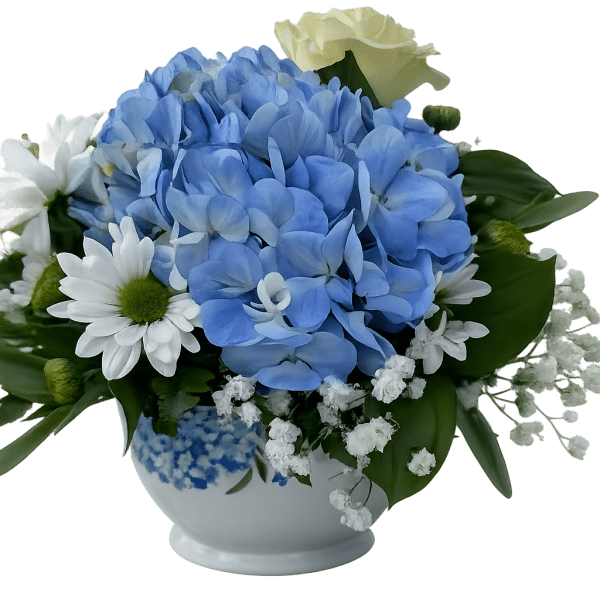 Blue hydrangea bouquet with white roses and daisies in a white vase
