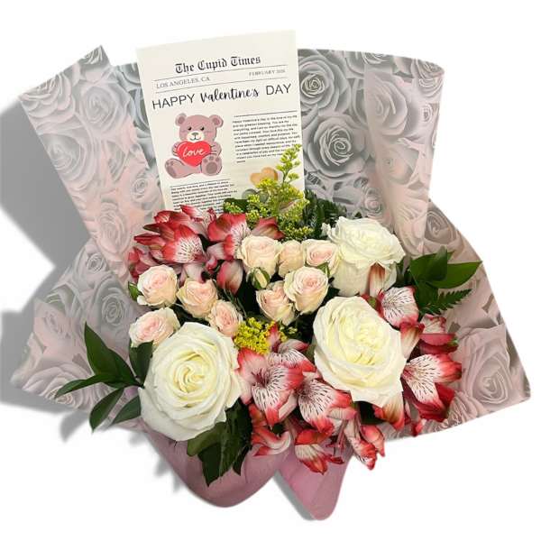 Bouquet of white roses and pink alstroemeria with a Valentine card