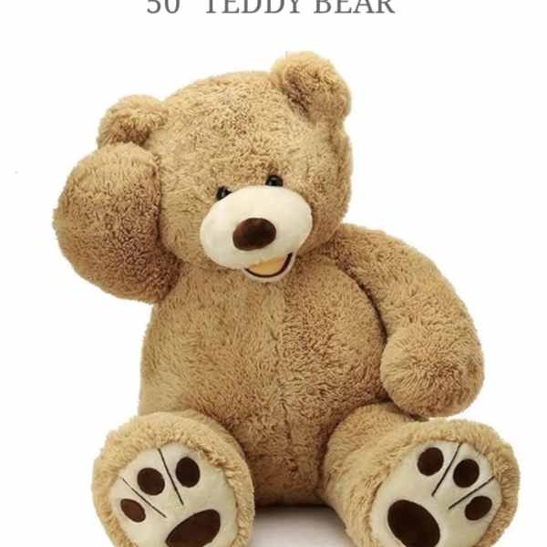 Large tan teddy bear plush sitting on a white background