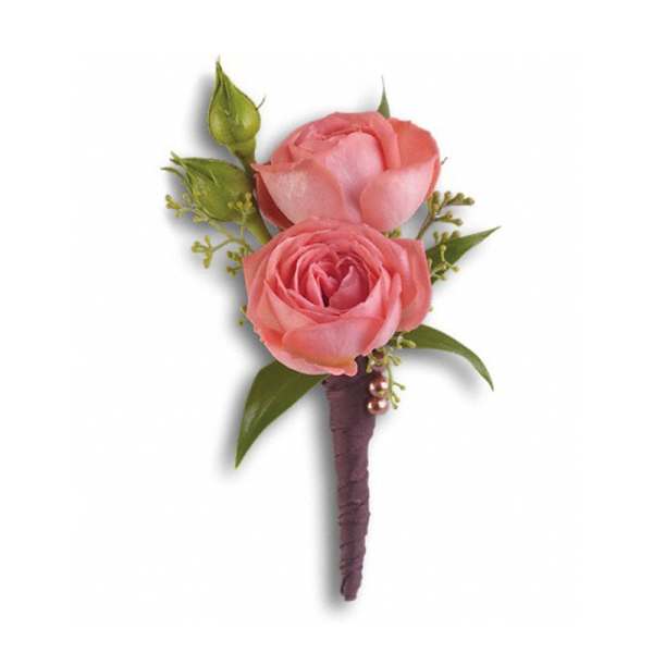 Pink rose boutonniere with green buds and leaves