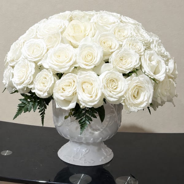 White Roses in cup