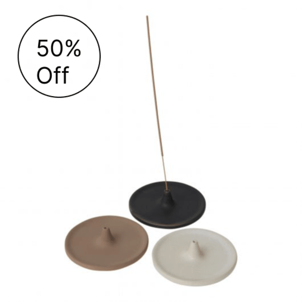 Three round metal bases with a thin rod, shown in black, tan, and white.