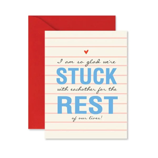 A sympathy card with the words "STUCK REST" on a red envelope